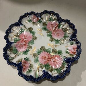 hand-painted porcelain Nippon serving plate or bowl featuring a floral pattern